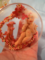 baby fairy in an acrylic bubble