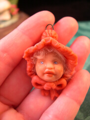 Baby Pendant made from push mold and polymer clay