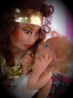 gypsy doll looking at her baby