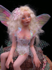 Dollhouse Mother Doll with colorful cicada wings