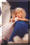 angel doll leaning