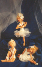 three ballerina dolls made of polymer clay