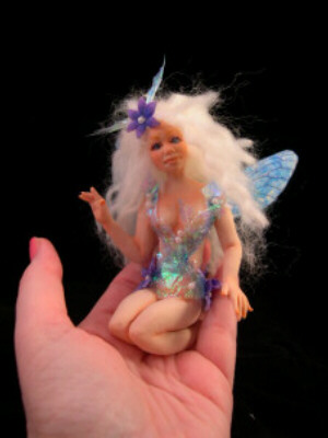 fairy doll in hand