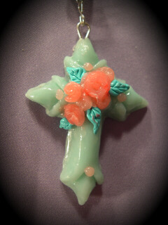 faux jade gothic cross with pink roses and green leaves