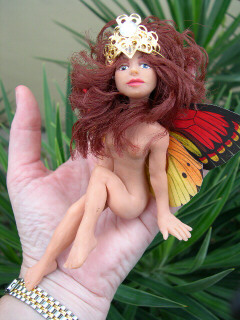 lady fairy doll in woman's hand