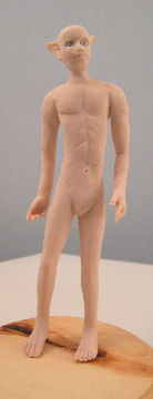 teen boy doll in clay